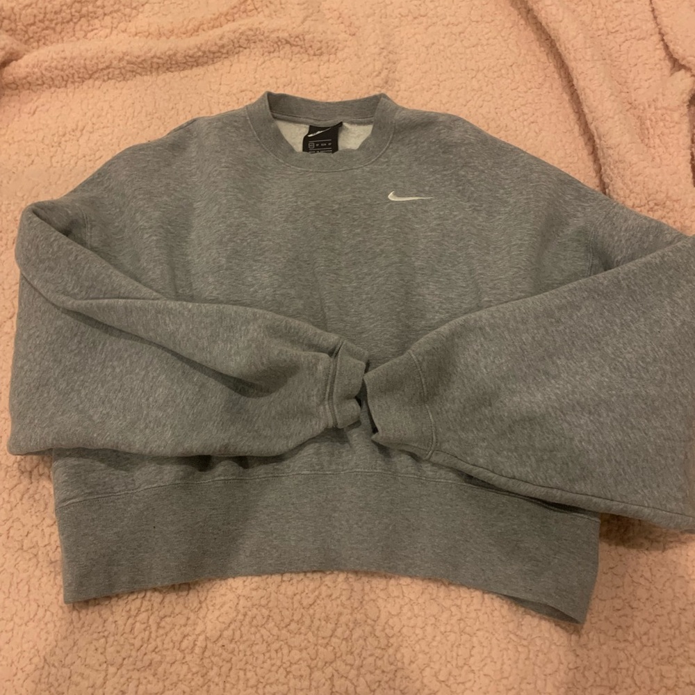 oversized grey nike crewneck.